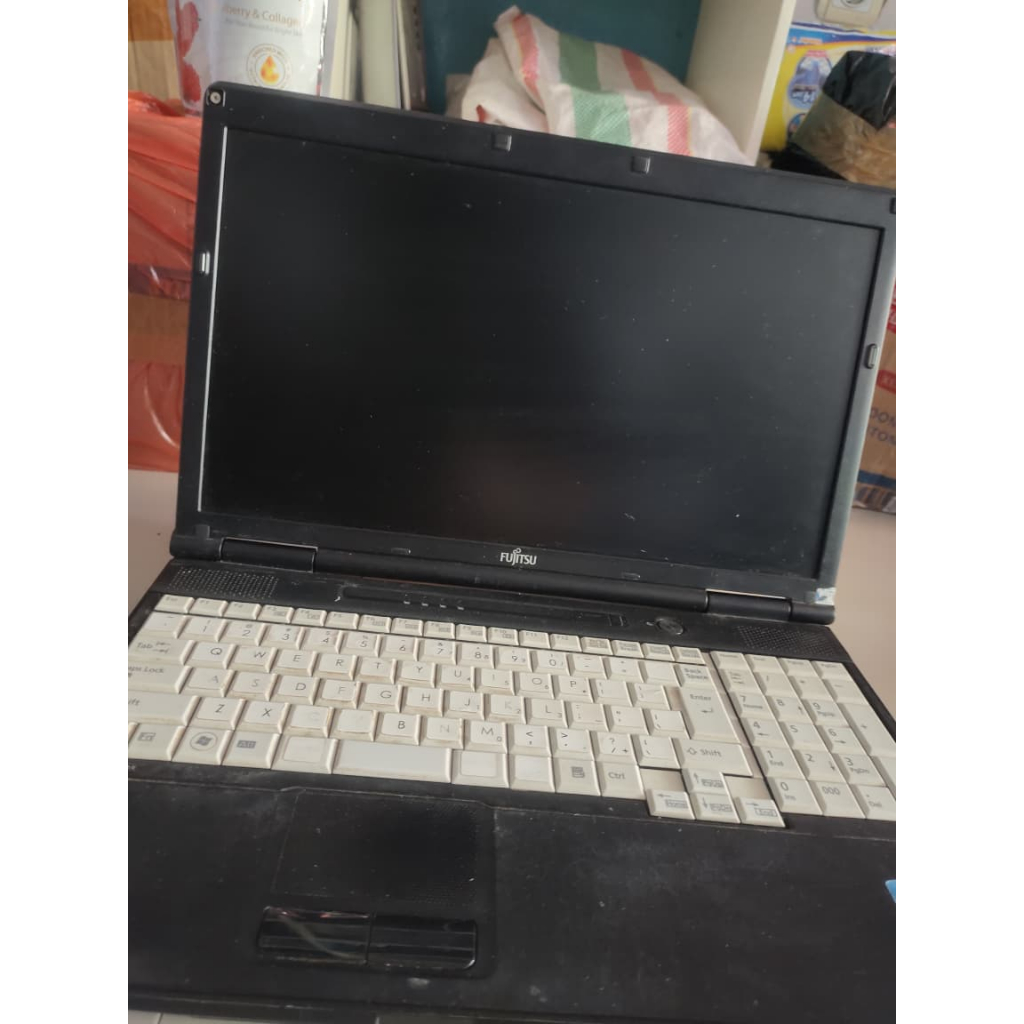 Laptop Fujitsu ADP-65JH ABZ Bekas – Cocok untuk Kerja Ringan & Office