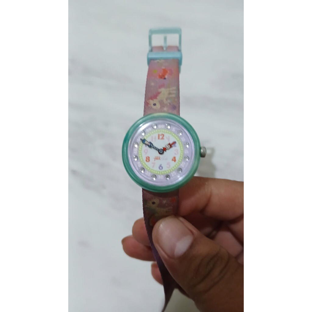 Preloved Jam tangan anak perempuan swatch