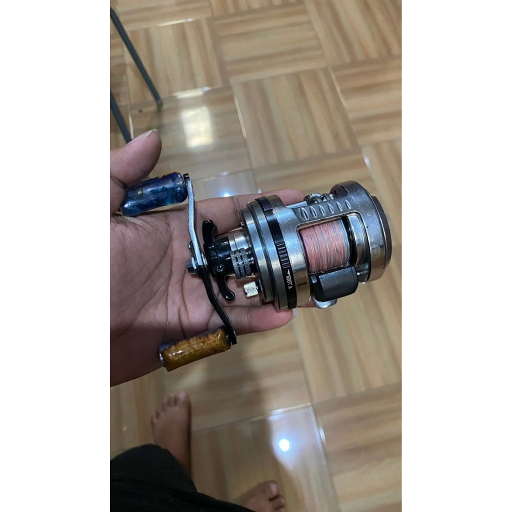 reel baitcasting sabre dx 101 left handle