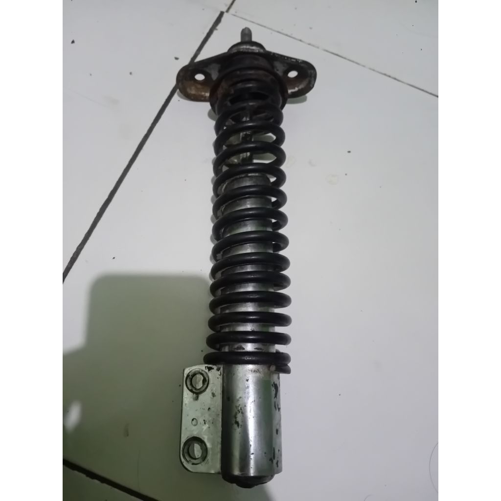 shock depan vespa. px