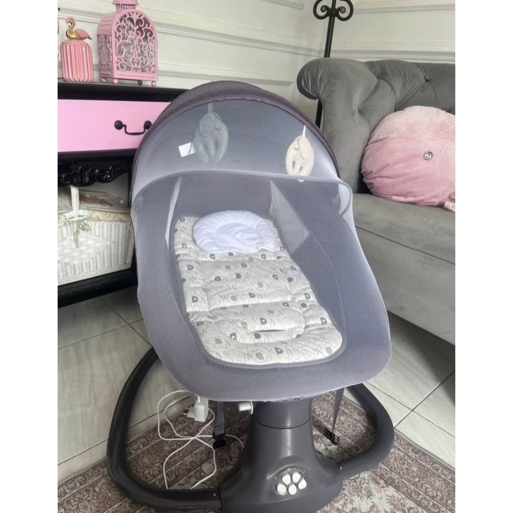 Preloved bouncer cocolatte snuggli