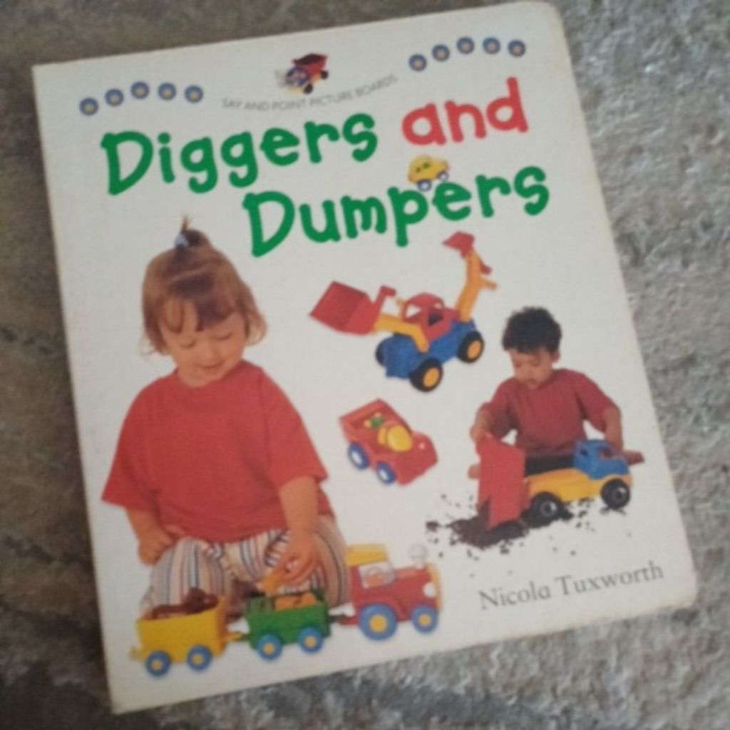Diggers and Dumpers board book. Discounted.
