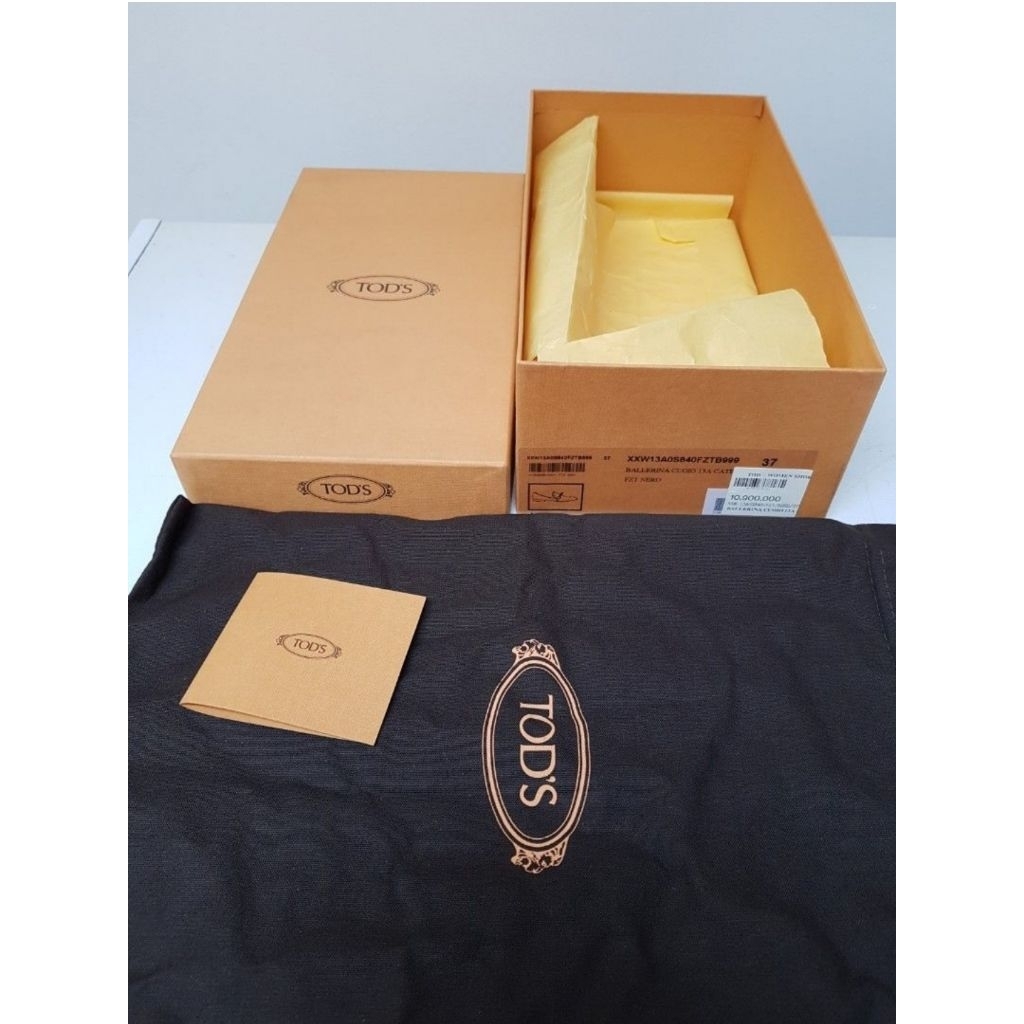 kotak sepatu tods
