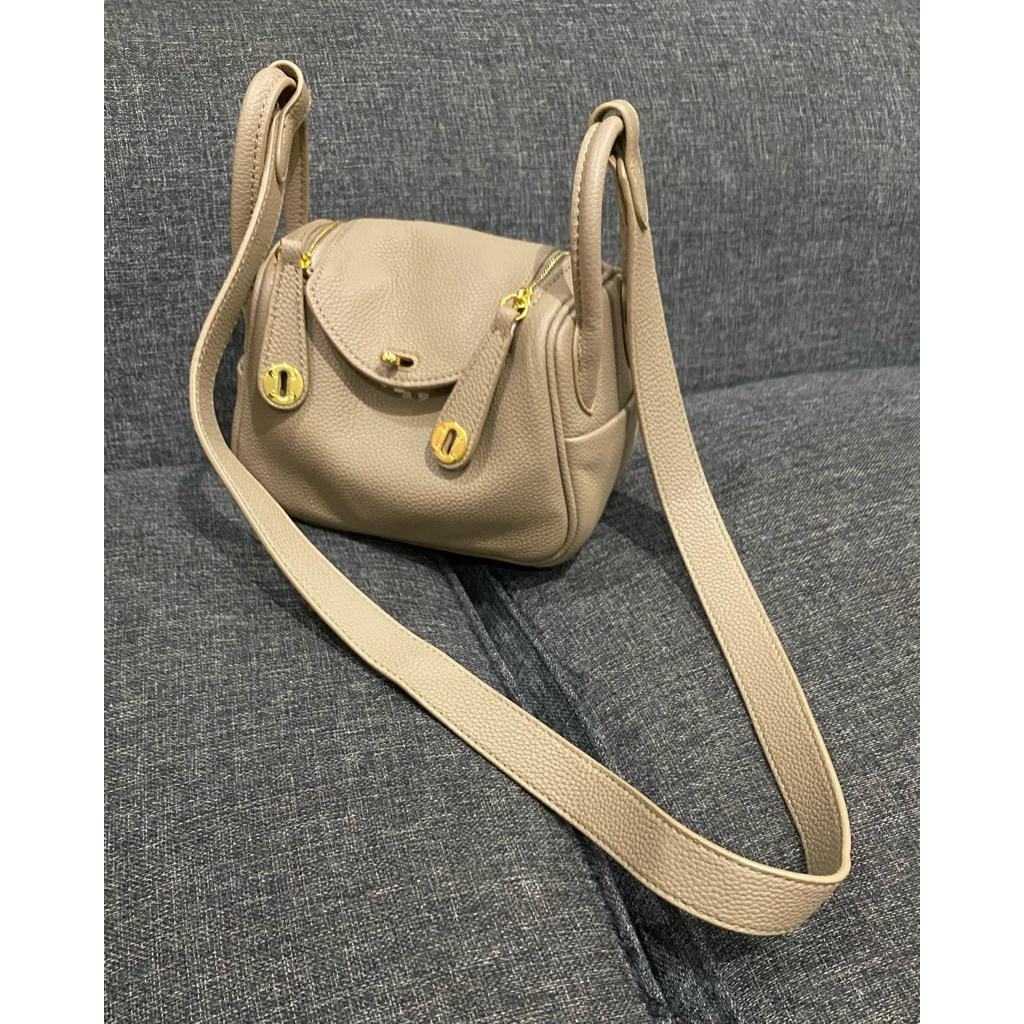 T.183 tas kulit asli sling ala lindi mini
