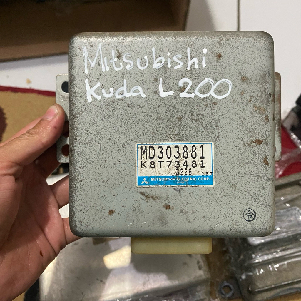 ecu mitsubishi kuda L 200 copotan mobil original