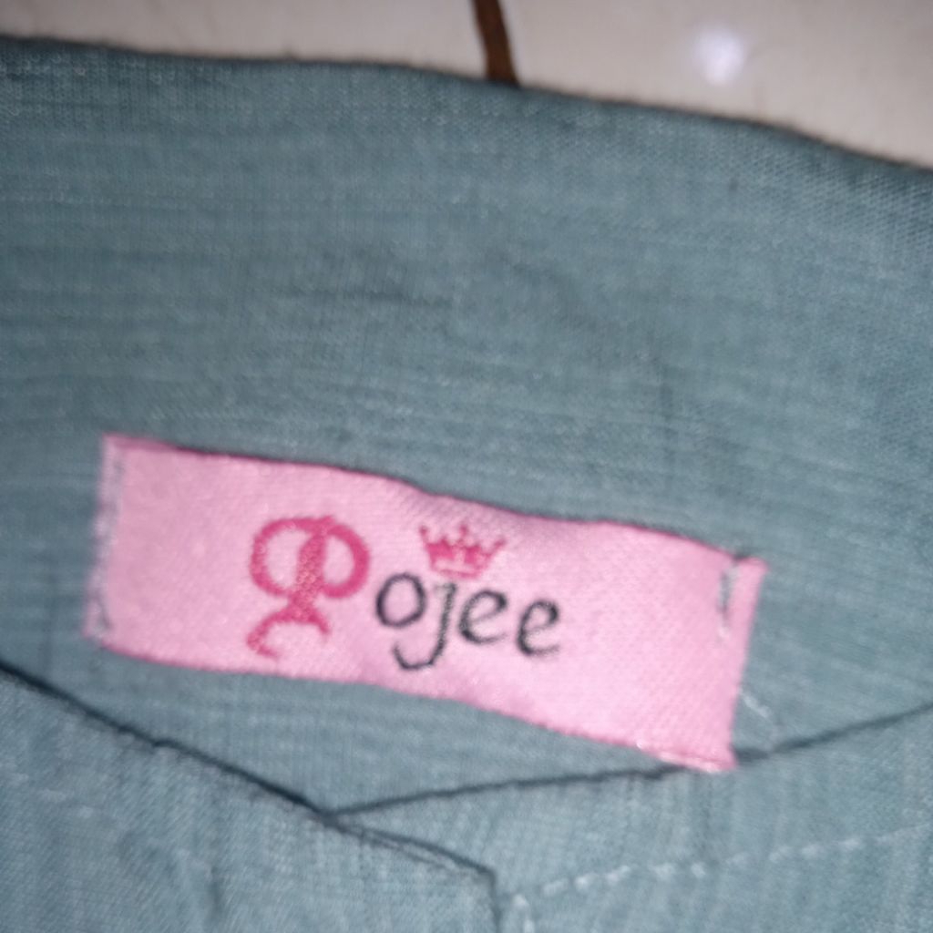 Atasan wanita merk Pojee
