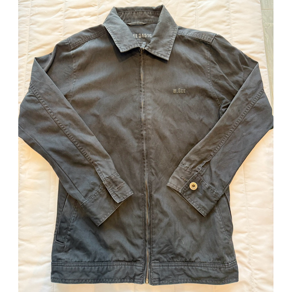 Jaket M.GEE 3451C Original Pria Casual Polos Hitam Size L