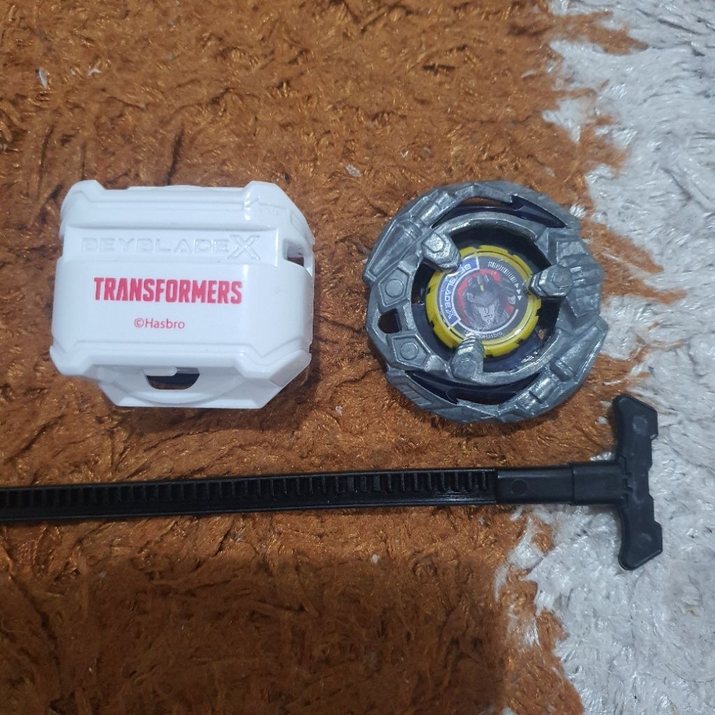 BEYBLADE X TRANSFORMERS LIMITED EDITION - BEYBLADE X BLADE STARCREAM + LAUNCHER TRANSFORMERS EDITION