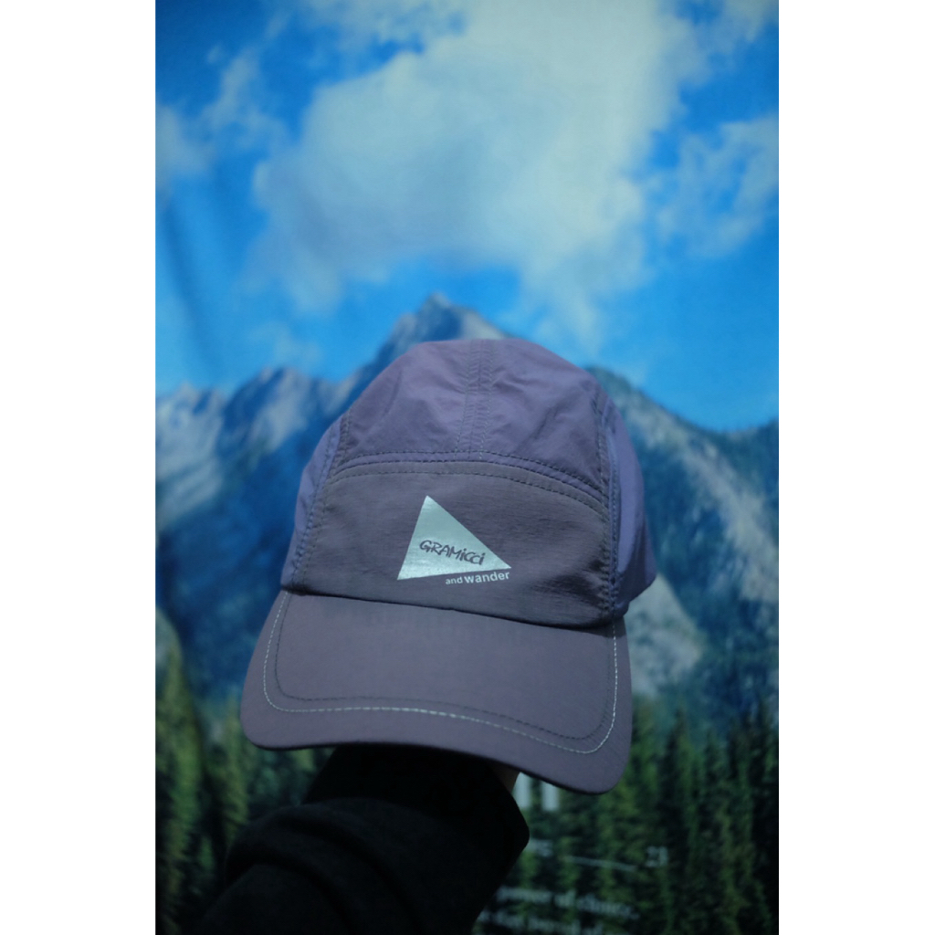 And Wander x Gramicci Patchwork Wind Cap in purple
