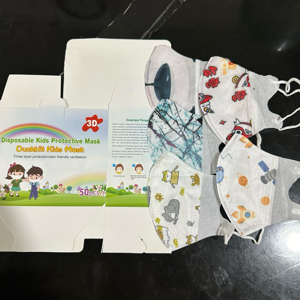 MASKER DUCKBILL ANAK MOTIF WEMAZE 3PLY ISI 50 PCS FACEMASK PREMIUM