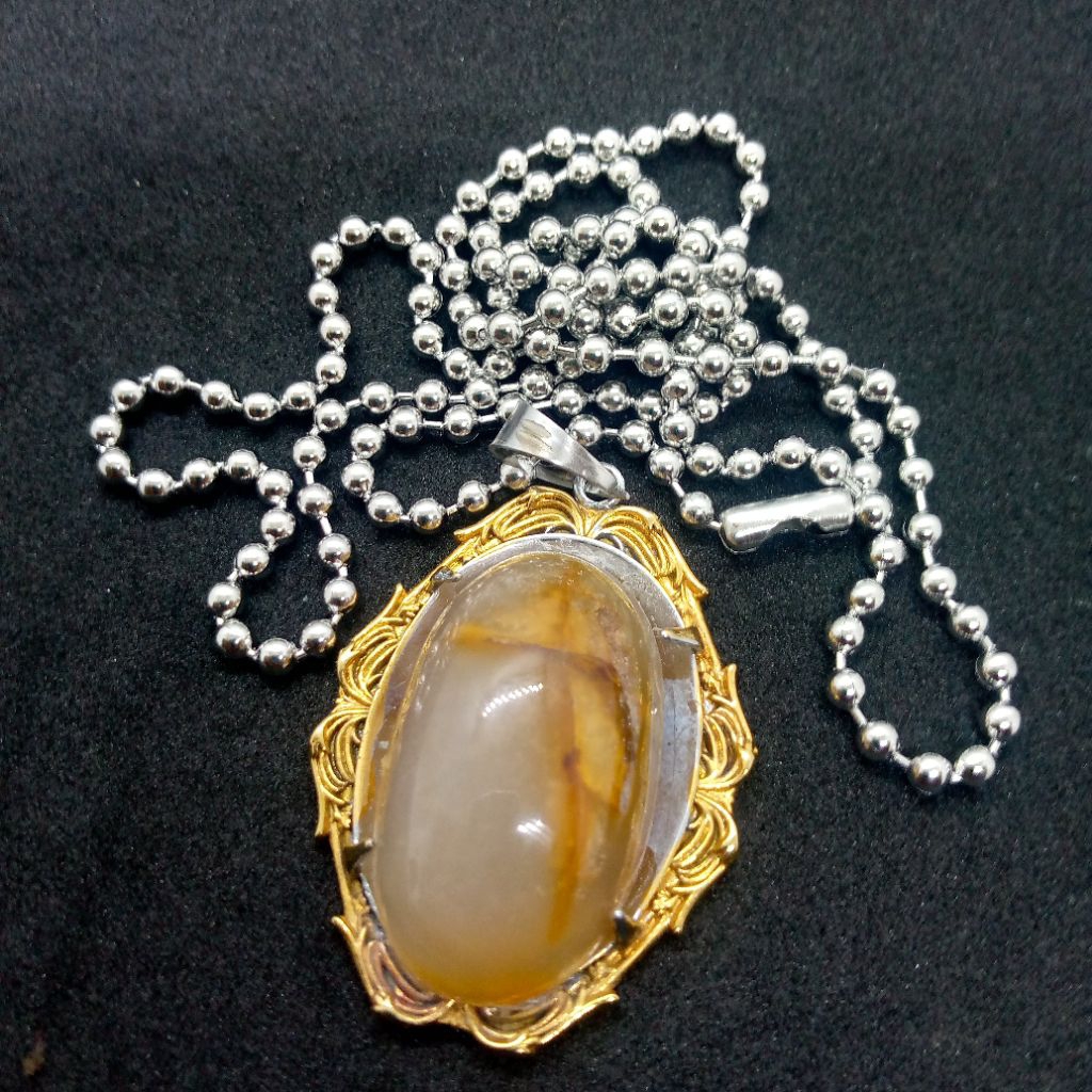 Liontin Batu Sulaiman madu Combong Bungkem dan Keris Natural Alam