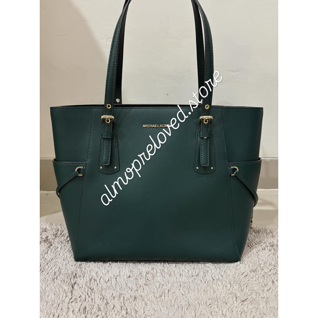 Preloved MK green voyager tote