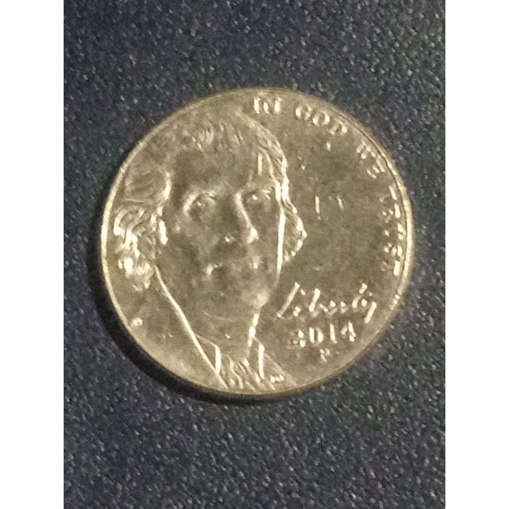 adalah koin 5 sen Amerika Serikat atau dikenal sebagai "Jefferson Nickel".