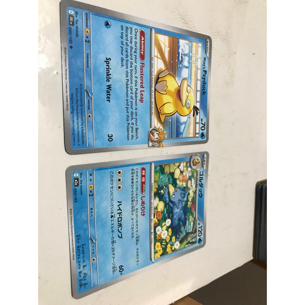 kartu pokemon psyduck golduck