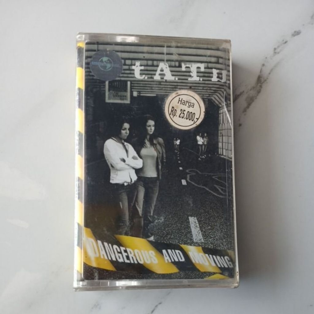 kaset pita tatu dangerous and moving segel