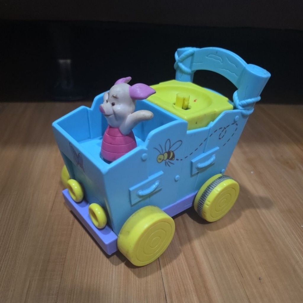 TOMY - Push and play piglt pooh