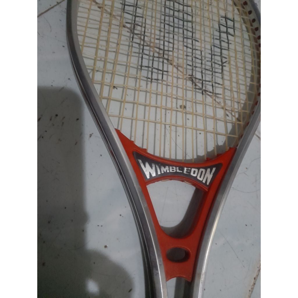 raket tenis bekas pakai