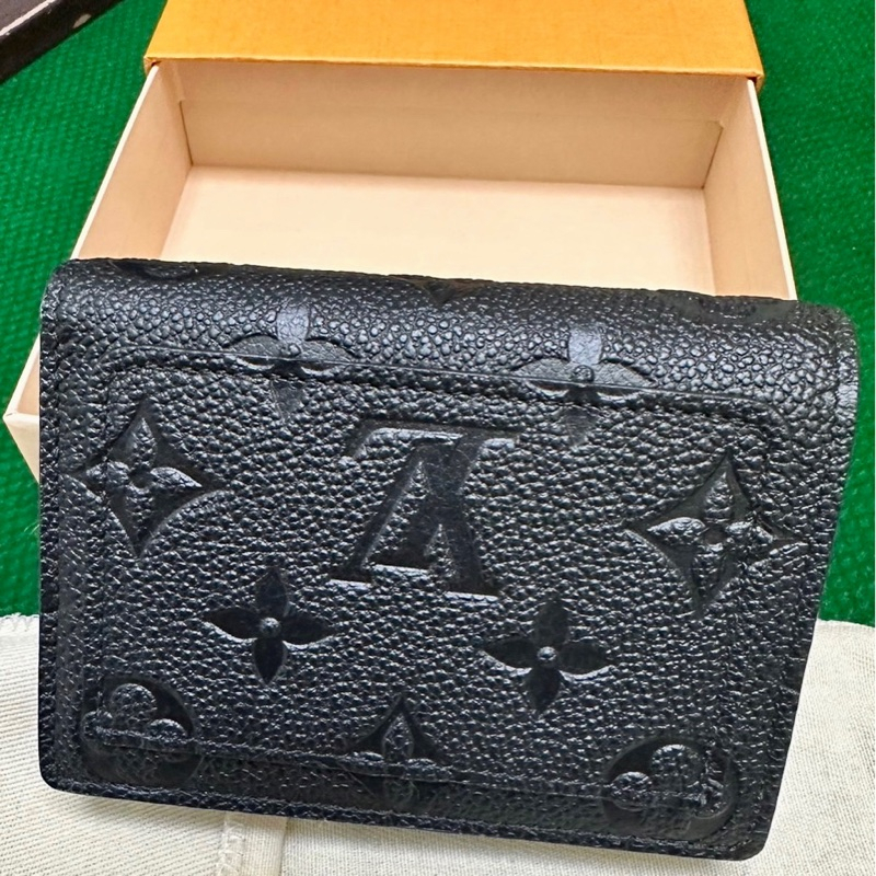 Dompet wanita Louis Vuitton Cléa M80151 / M80152 preloved dari Prancis dengan desain hitam klasik da