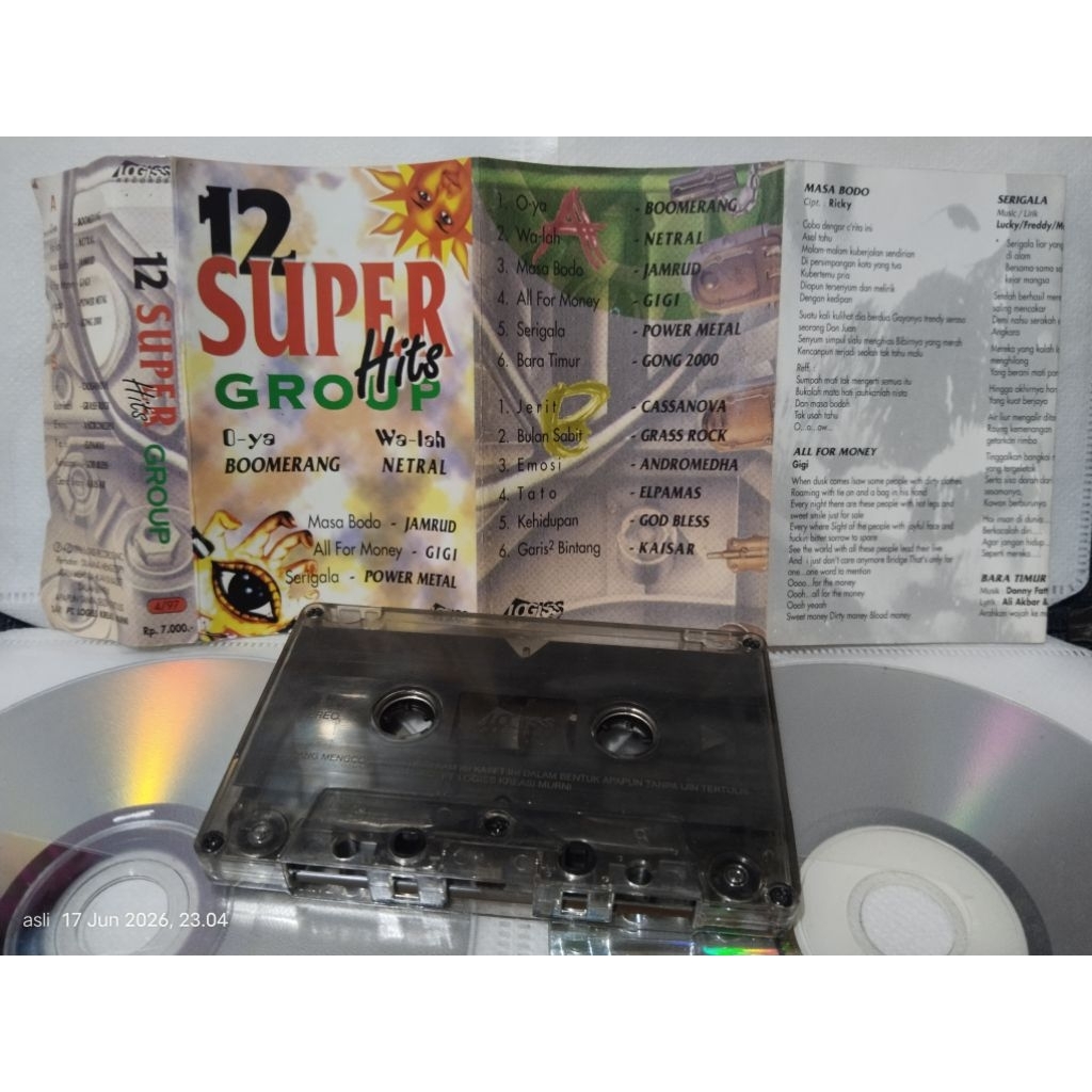 kaset pita 12 super group hits ( boomerang, grass rock, andromeda, elphamas, godbless)