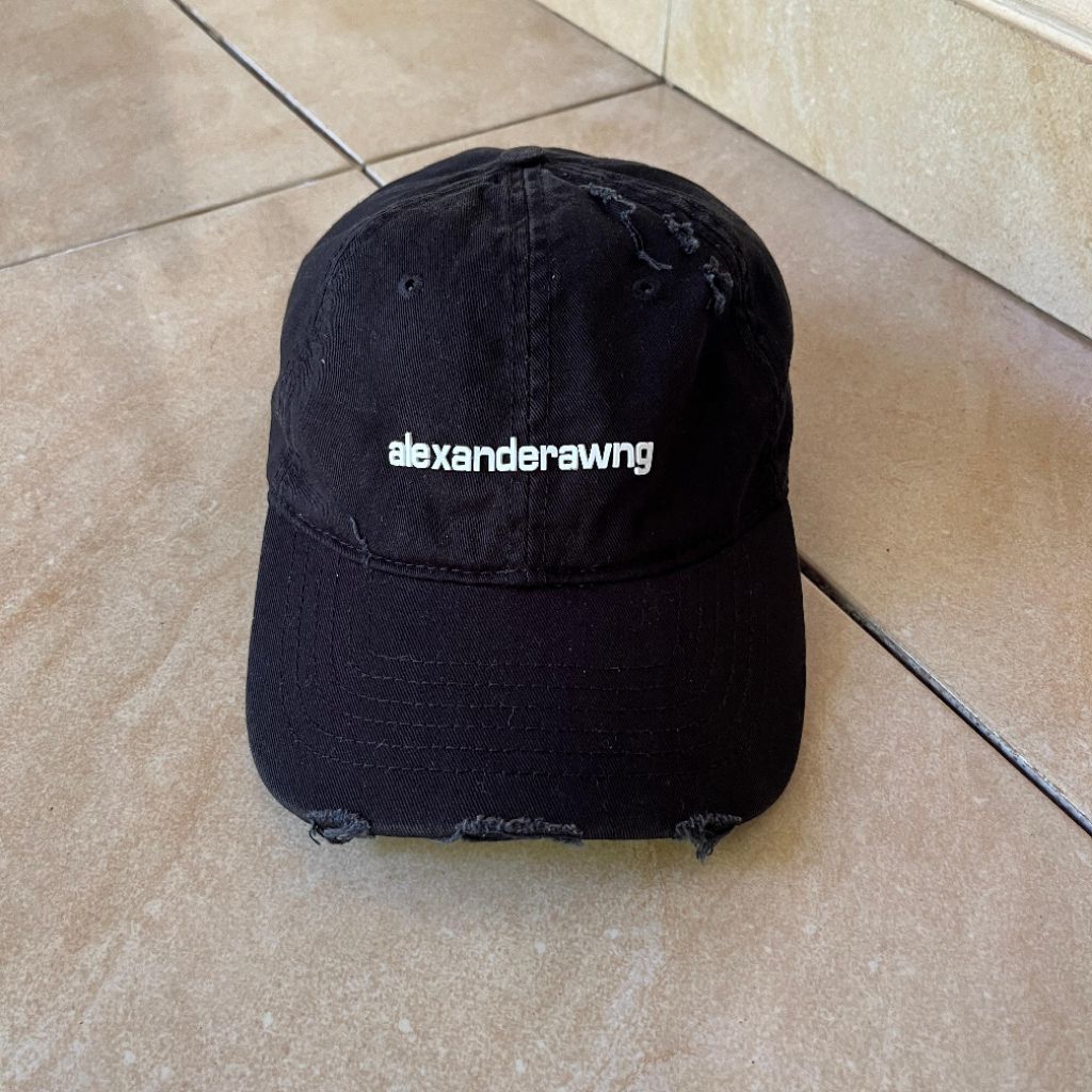 topi ripped not Alexander Wang hitam