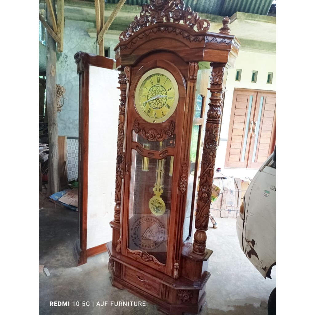 lemari jam lonceng / lemari jam kayu jati putih / lemari jam kayu jati jepara / jam lonceng lemari