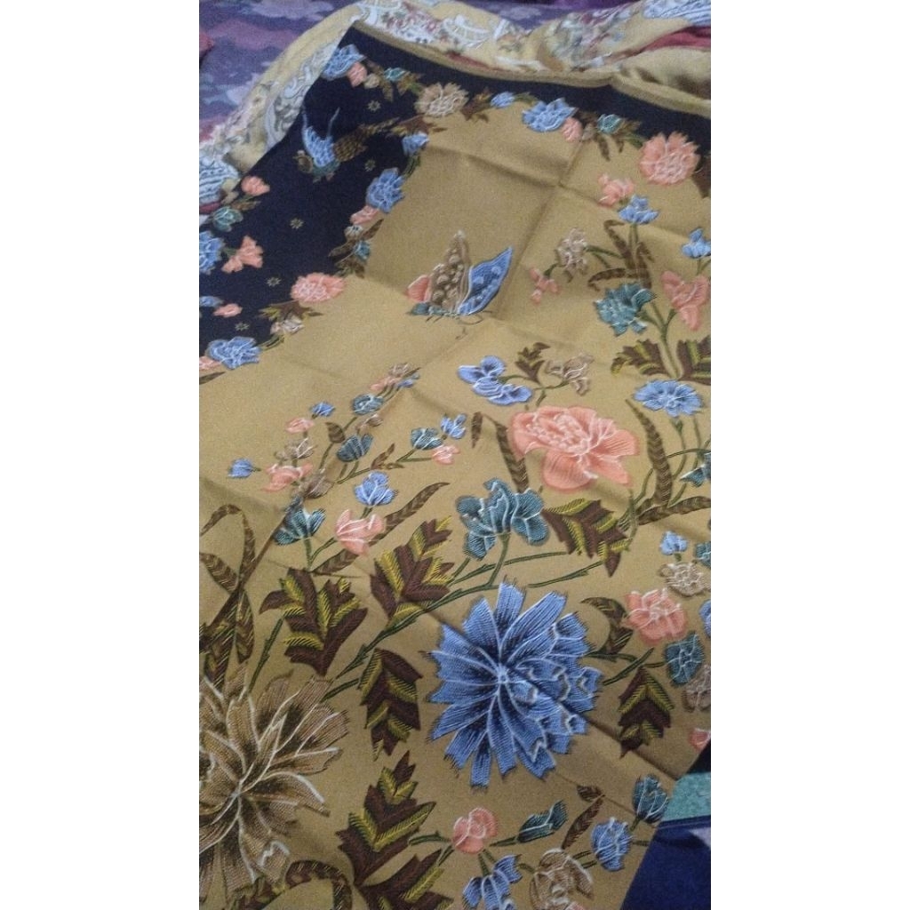 kain batik halus,sarung cap Iskandar text