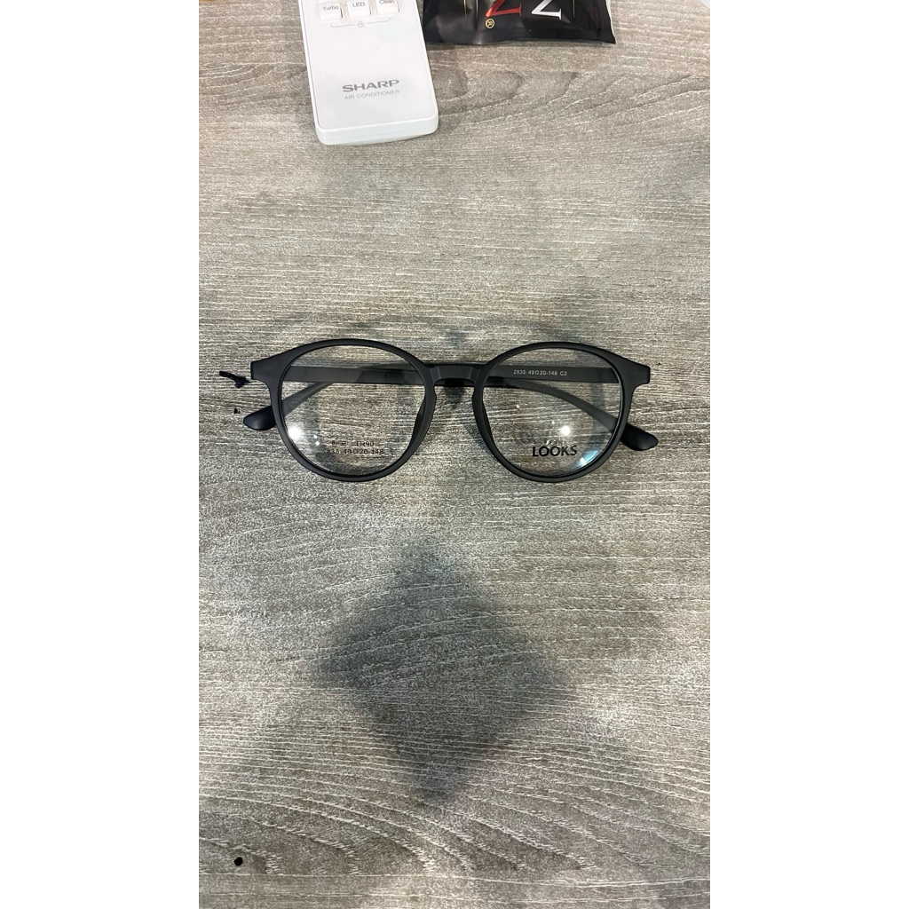 frame kacamata prisma