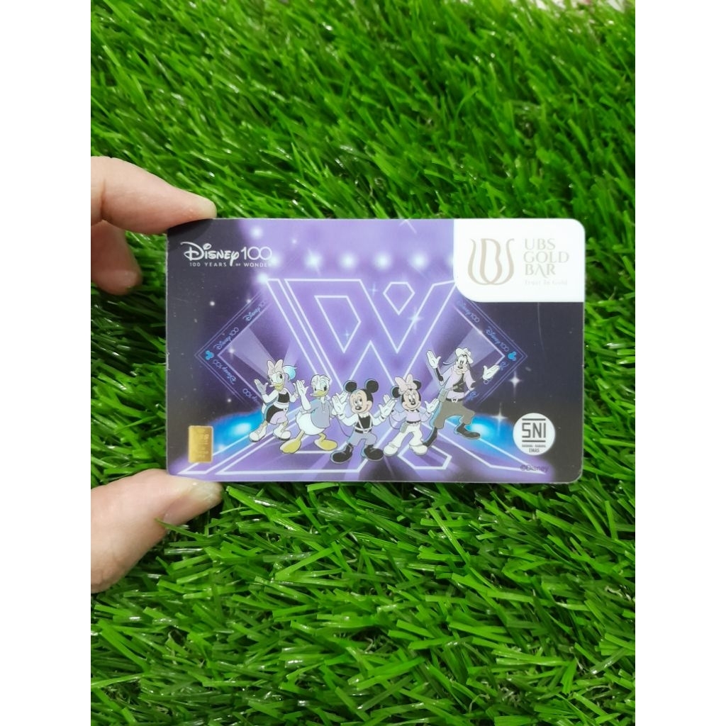 Logam mulia UBS 0.1 gram disney 100thn