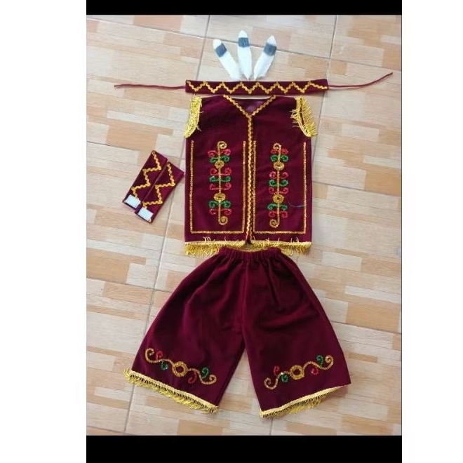 baju adat Dayak anak laki laki