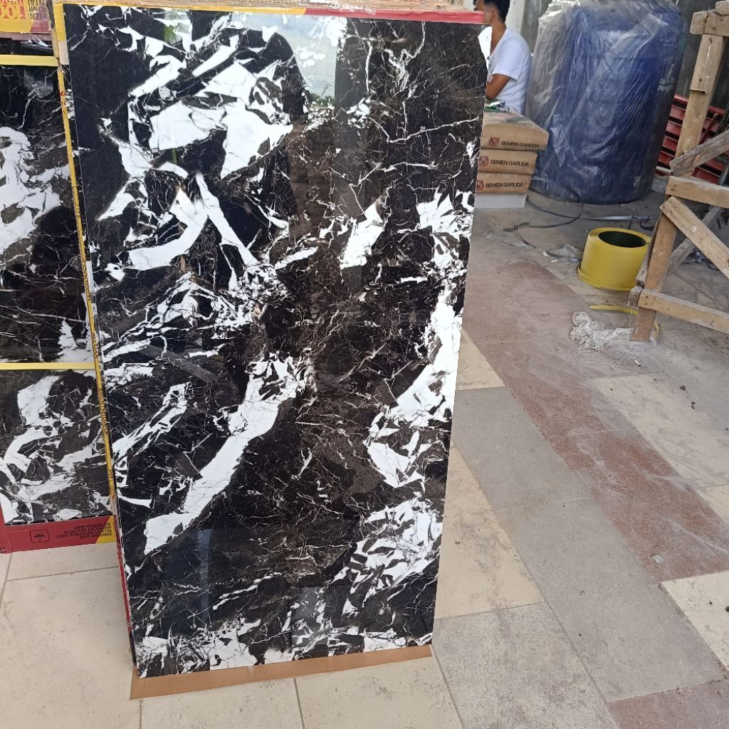 Granit 60x120 hitam motif marmer Fosill black ikad