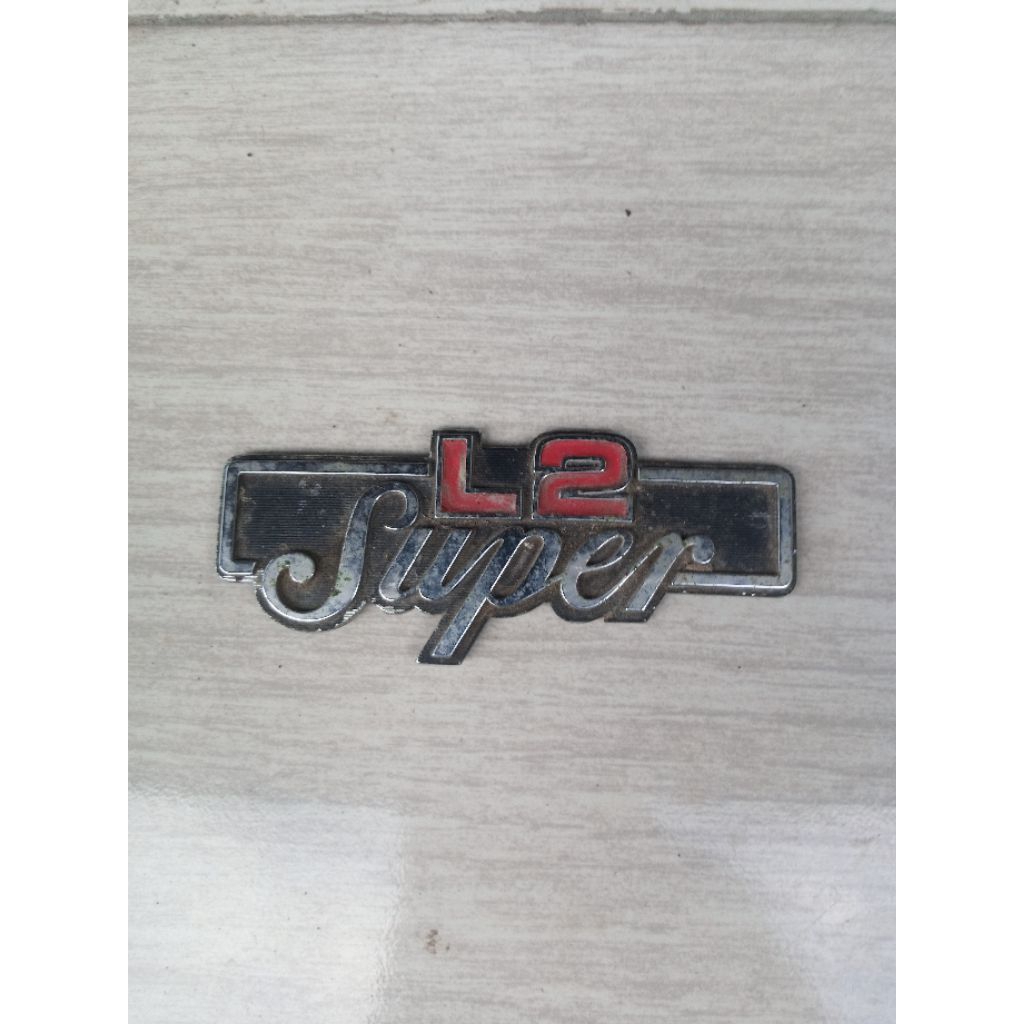 emblem cover aki yamaha l2sn original