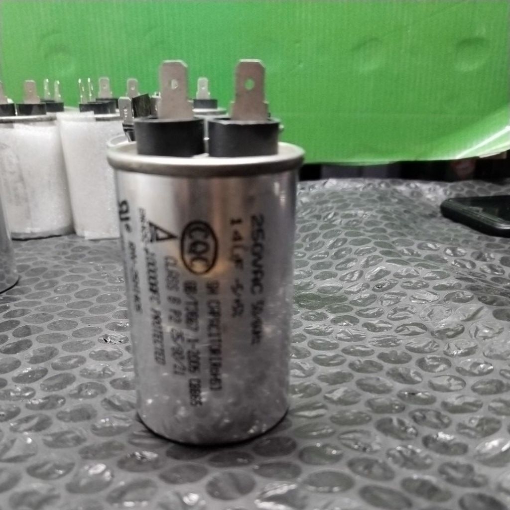 capasitor mesin cuci 14uf CBB65 SH Capacitor (Kapasitor Jalan).Tegangan: 250VAC 50/60Hz.