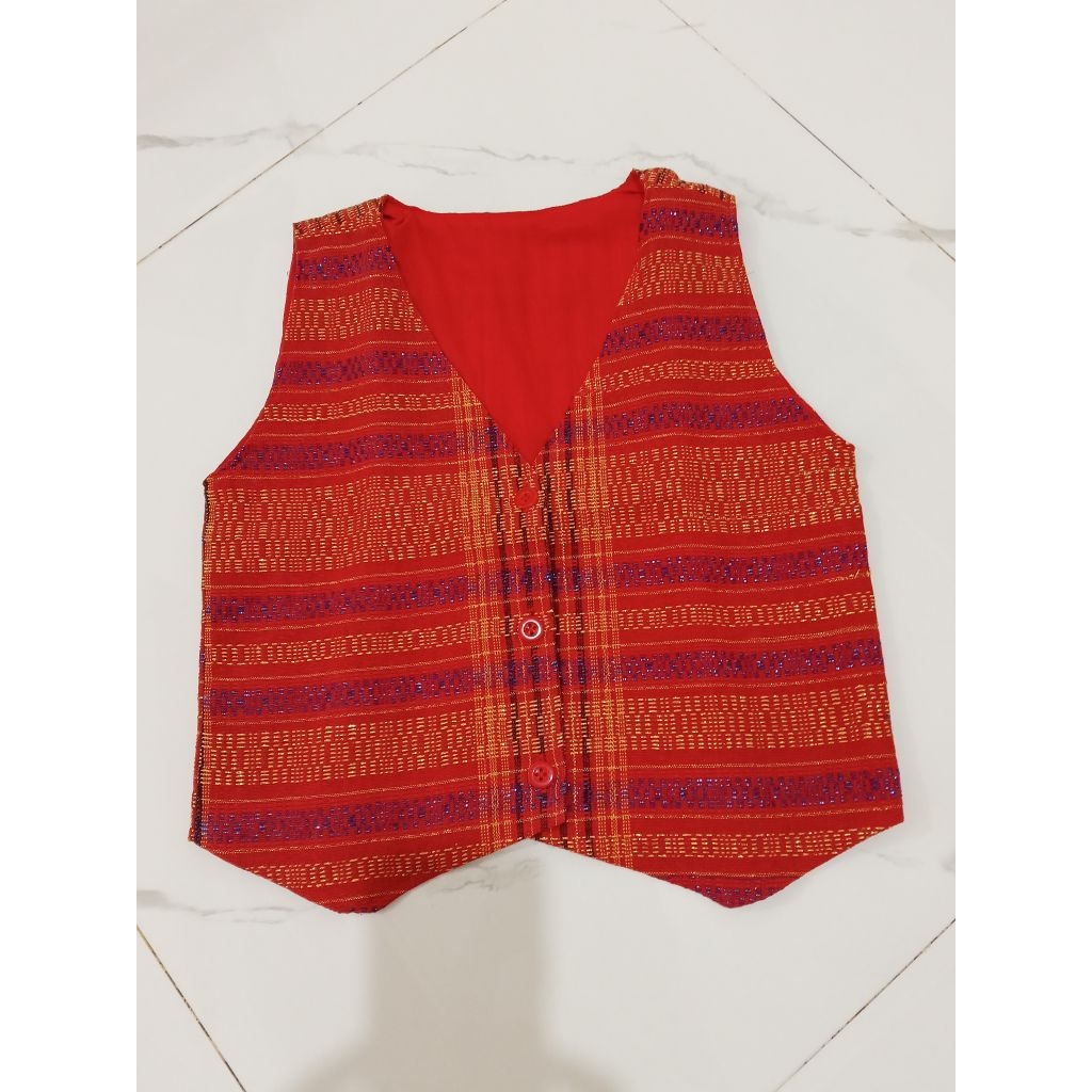 Rompi ulos ragihotang untuk anak cowok