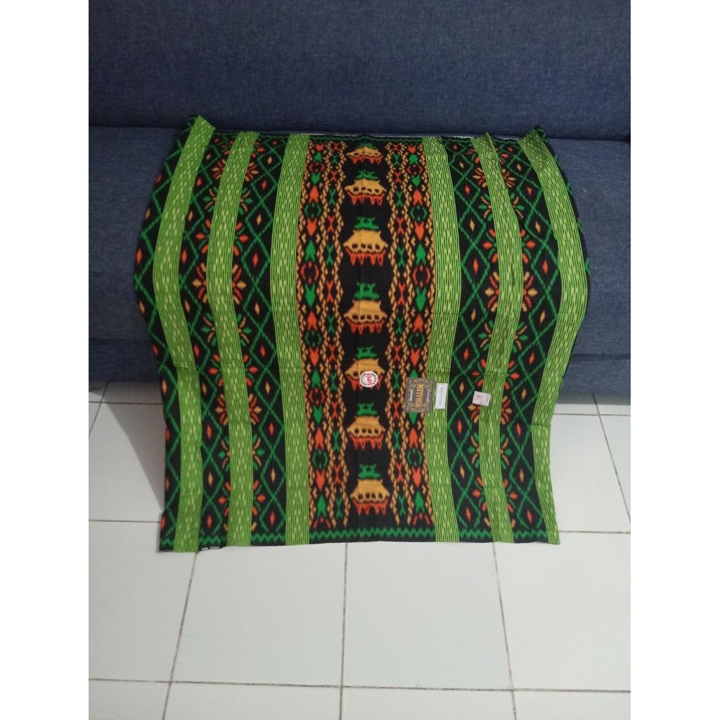 sarung partamiangan motif karo