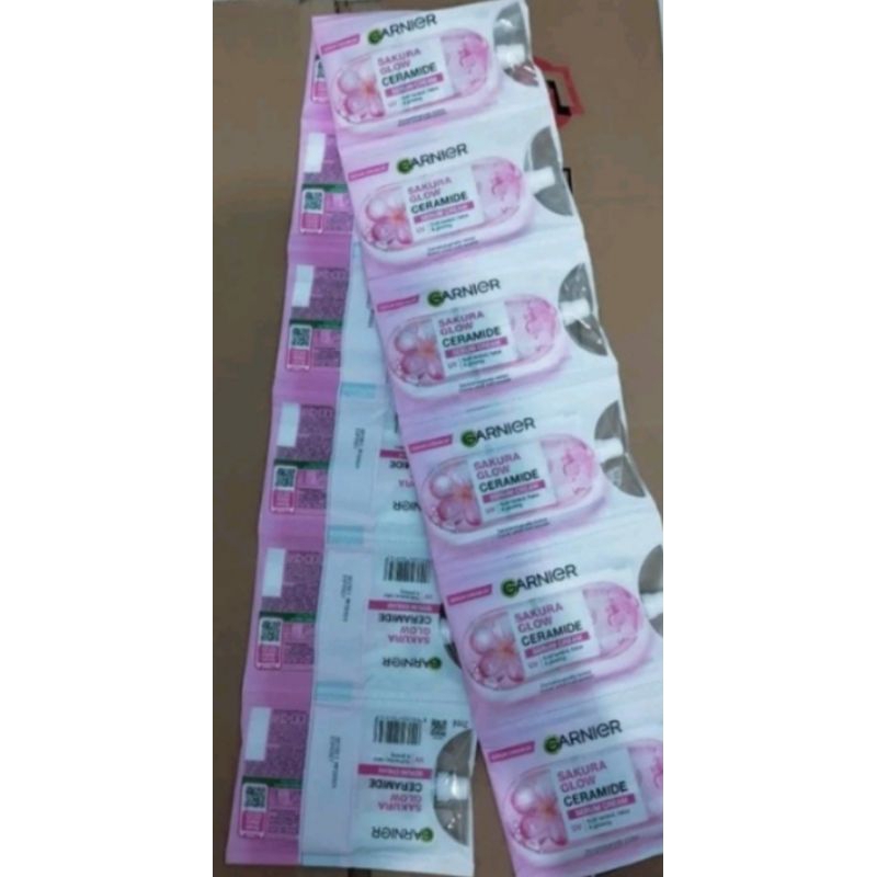 Garnier Sakura Glow Ceramide Serum Cream Uv sachet 7ml/krim wajah (1renteng isi 12 pcs)