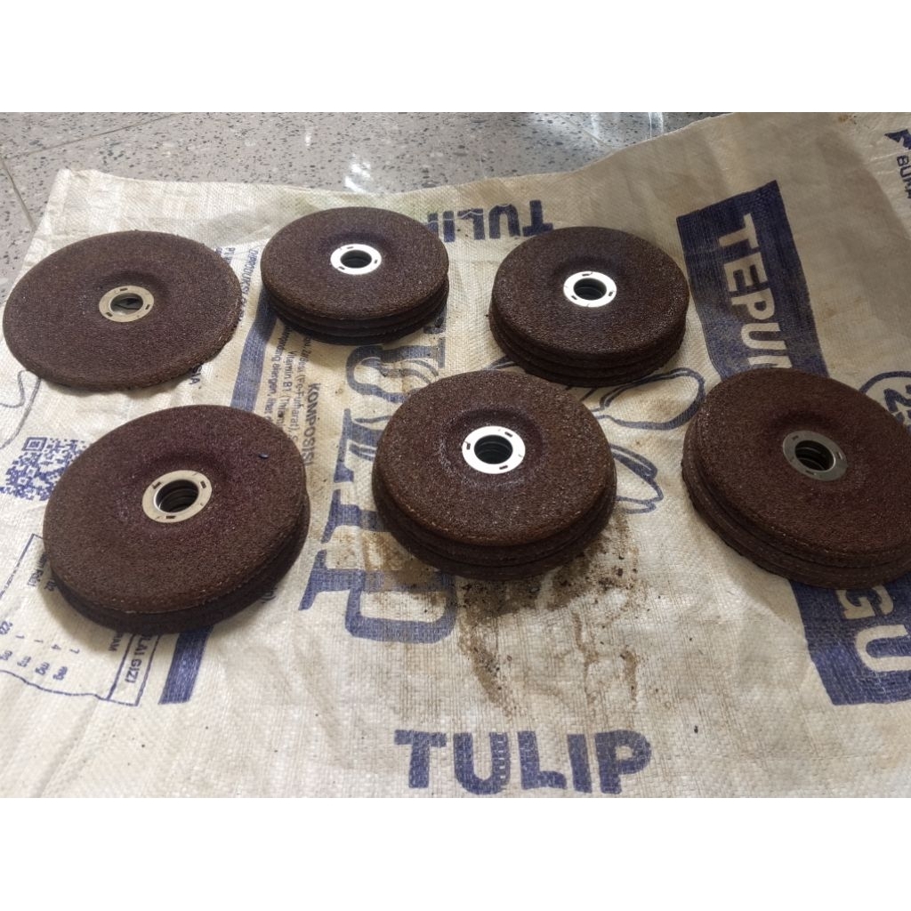 Batu gerinda bekas pabrik layak pakai