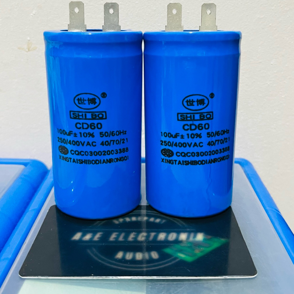 Capasitor mesin 100uf 400v / Kapasitor Biru 100uf 250/400v CD60
