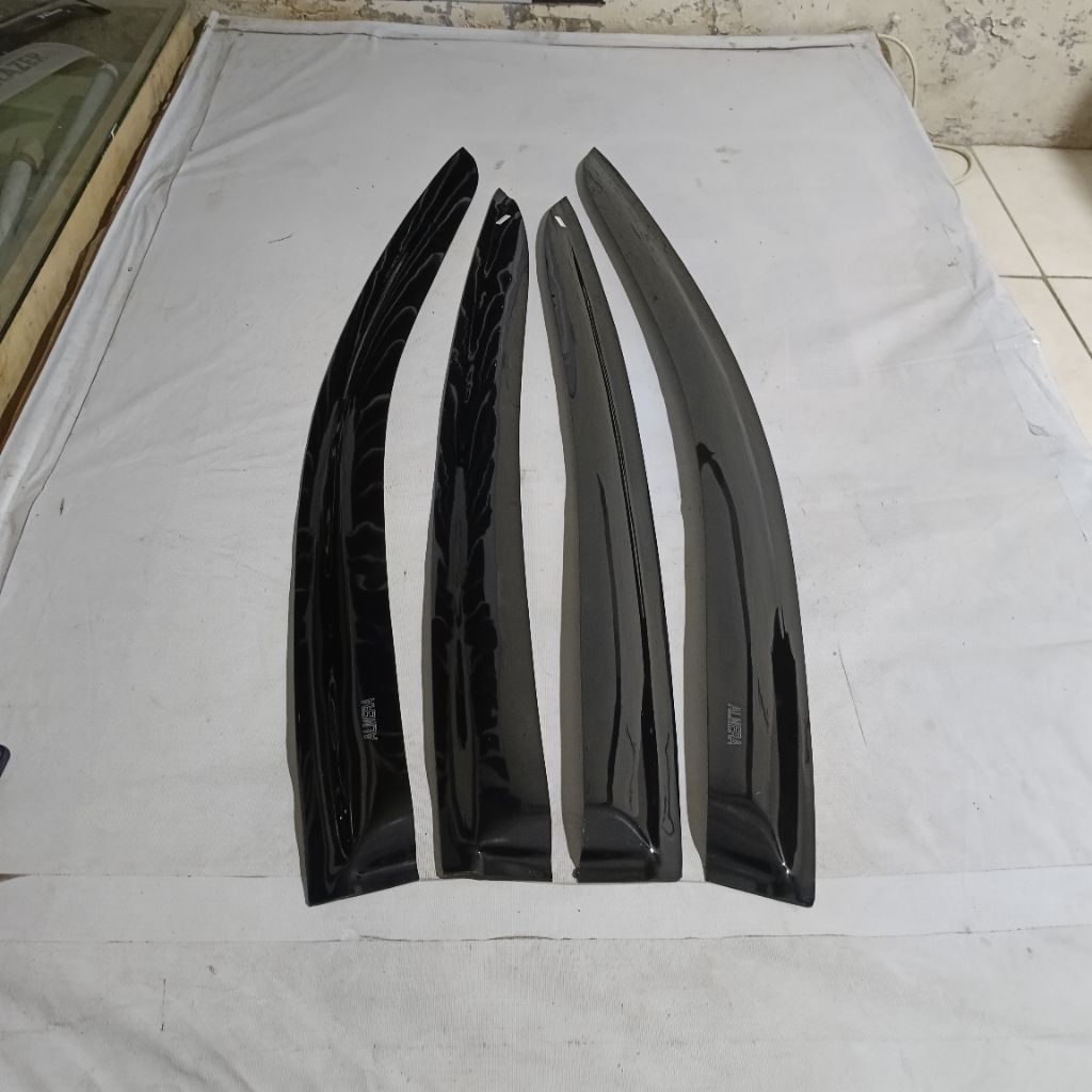 Talang air mobil Nissan Almera slim