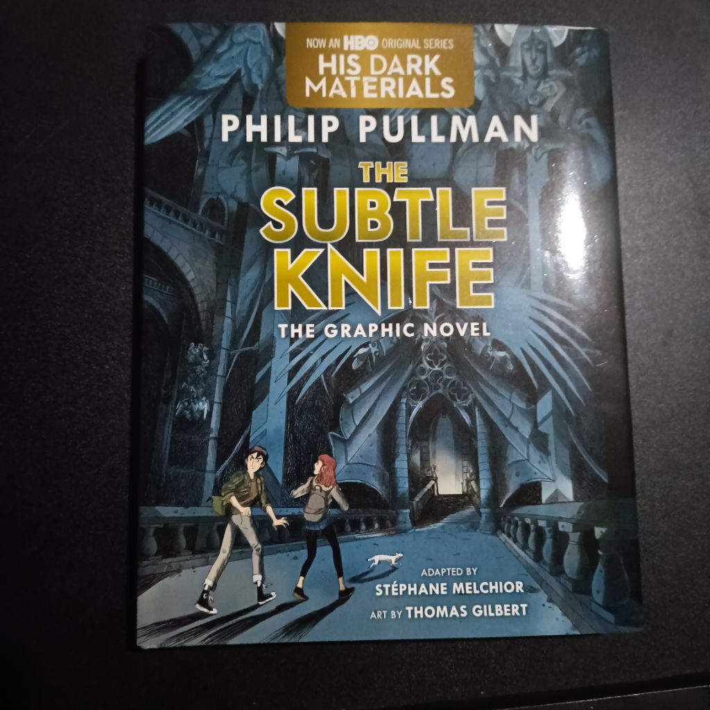 Buku The Subtle Knife (His Dark Materials #2) Graphic Novel - Philip Pullman [Preloved]