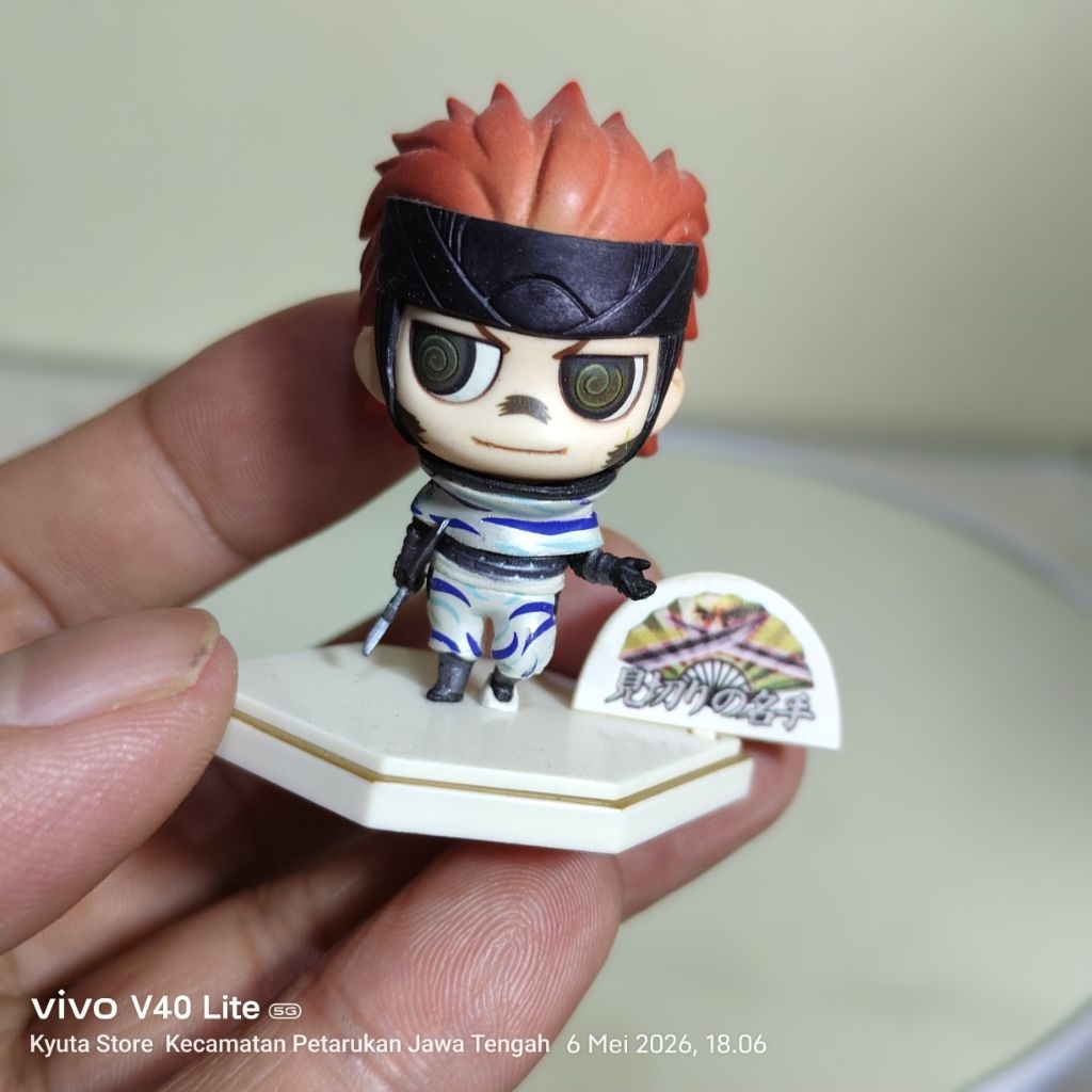 figur Sarutobi Sasuke dari seri One Coin Grande Figure Sengoku Basara (produksi Kotobukiya)
