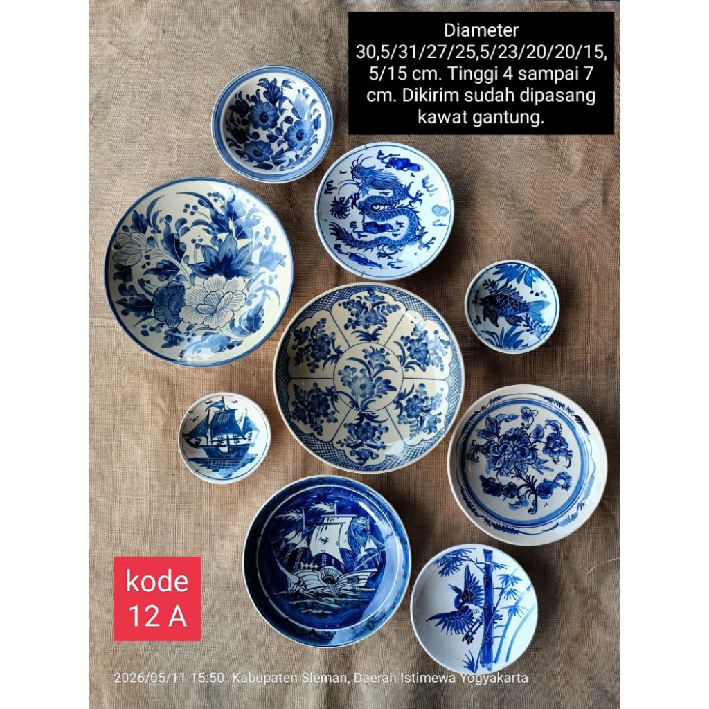 Diameter 31 cm an 30 cm an 25 cm an 23 cm an 20 cm an 15 cm an 9 buah piring keramik lukis biru puti