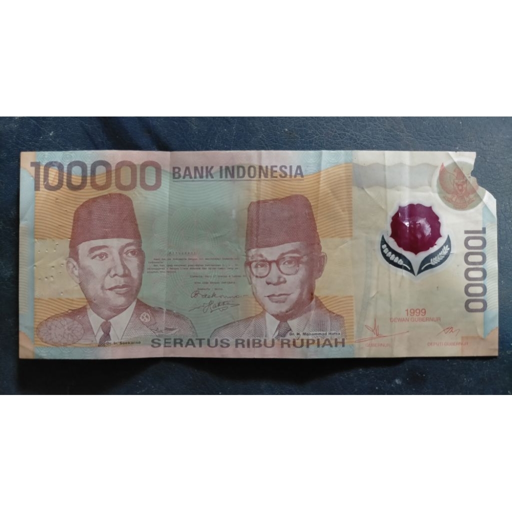 Uang 100000 Sukarno polymer 1999  jelek