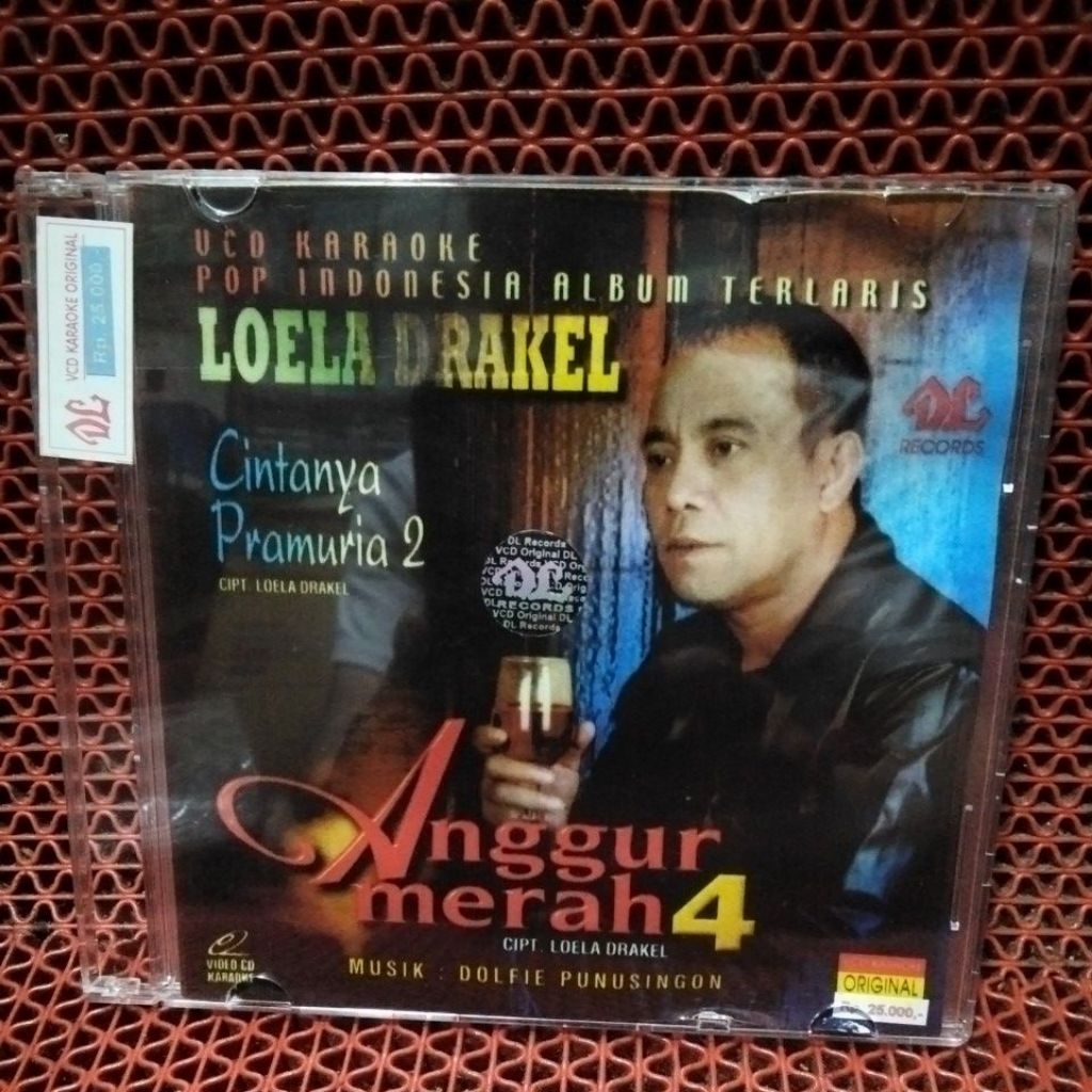 VCD LAGU POP MANADO KARAOKE LOELA DRAKEL 100% ORIGINAL BARU DAN MASIH SEGEL