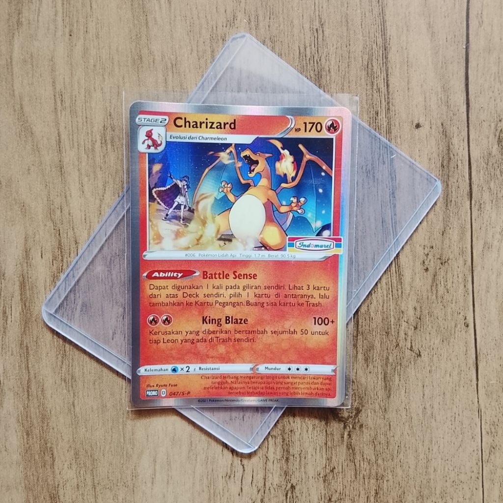 Charizard Indomaret free Sleeve & toploader - Kartu promo indomaret D 047/S-P - Pokemon TCG Indonesi