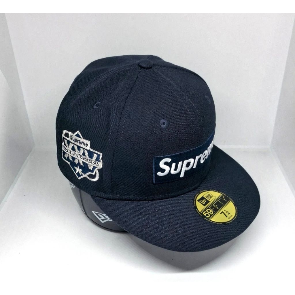 Topi New Era X Supreme