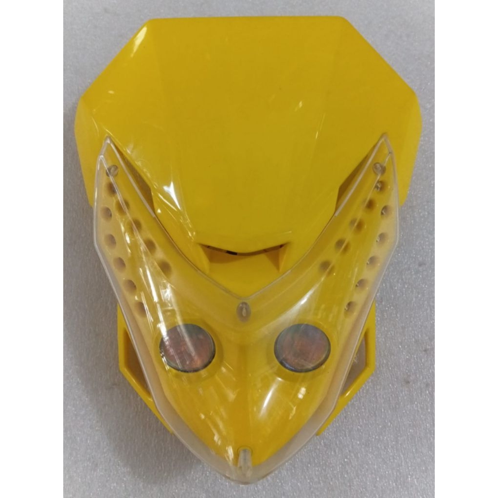 Lampu depan Acerbis kuning.