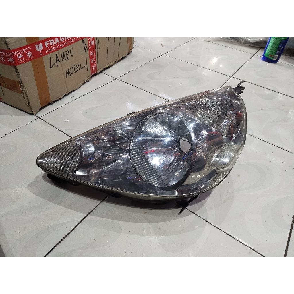 headlamp jazz idsi/gd3 2004/2005/2006/2007/2008 original. lampu depan jazz idsi 2004-2008