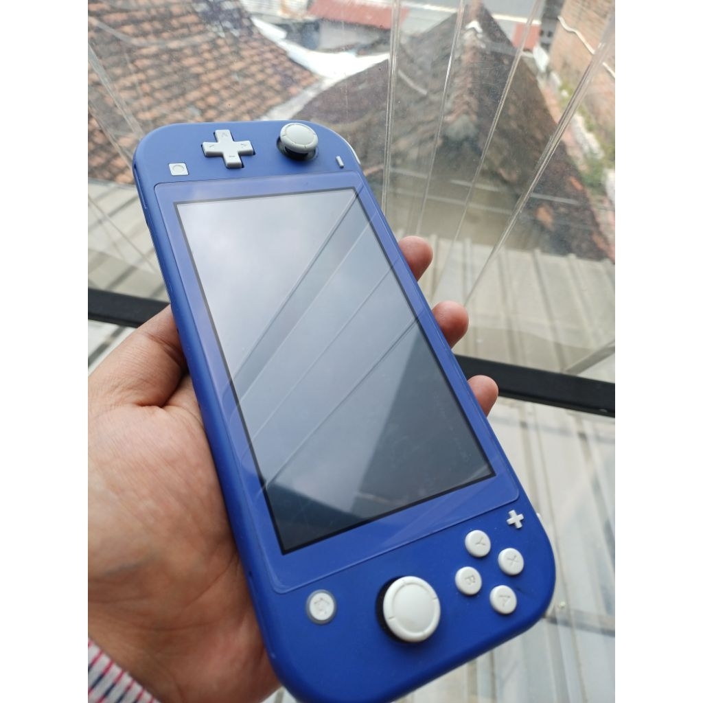 Nintendo switch lite ofw 64gb