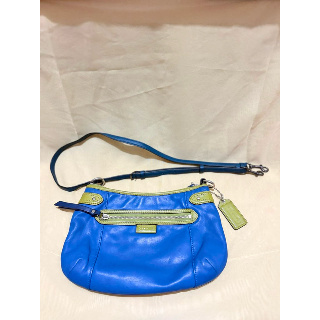 COACH Daisy Spectator leather crossbody bag in a vibrant moonlight blue and chartreuse color combina