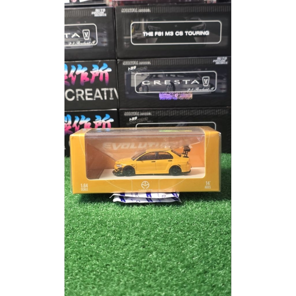 Time Micro 1:64 Mitsubishi Lancer Evo IX Yellow 053/999 Open Hood Sealed